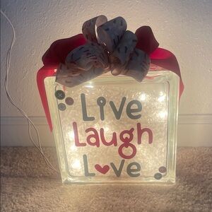 Light-up glass block with Sock Monkey ribbon bow.